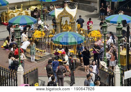 View Of The Hindu Shrine From Bts Skytrain And Thai And Foriener People Praying Thao Maha Phrom Or L
