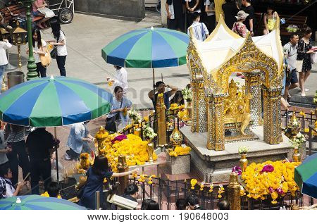 View Of The Hindu Shrine From Bts Skytrain And Thai And Foriener People Praying Thao Maha Phrom Or L