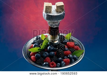 Closeup of hookah with tray full of berries