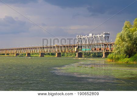 Bridge Across River Dnieper And Storm Clouds In Sky