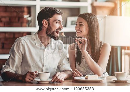 Couple In Love In Cafe