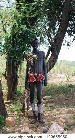 GanadaSouth Omo Ethiopia- 03 october 2012: Tsamai tribe man in national dress