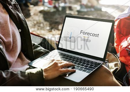 Businessman working on laptop network graphic overlay