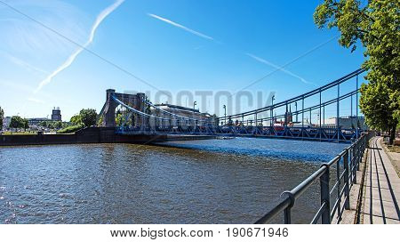 Wroclaw most famous buildings - Grunwaldzki Bridge on Odra river and Urzad wojewodski in the background