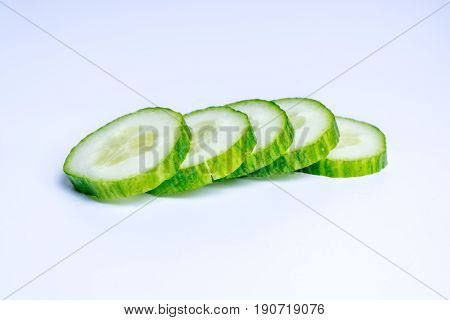 Cucumber slices ja isolated on white background