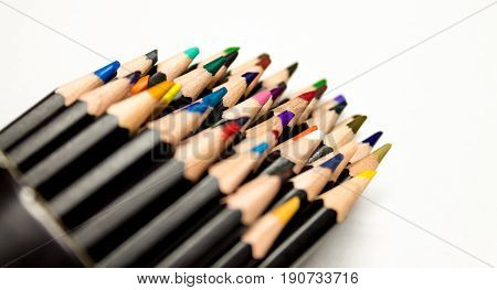 close up of spilled colored pencil container
