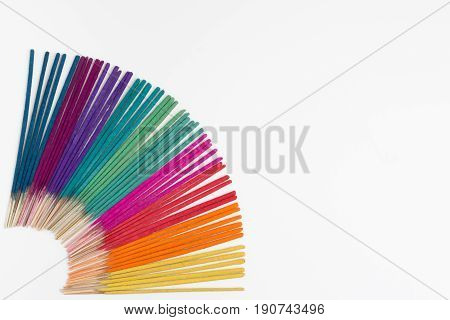 Colorful incense on white background. Top view