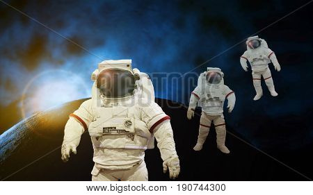 astronaut working on space with sun light with earth and cosmos background