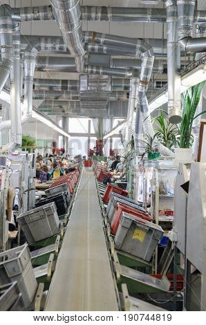 MOSCOW, RUSSIA - FEBRUARY 21, 2017: Moscow shoe factory JSC RALF RINGER . The main conveyor of the sewing workshop.