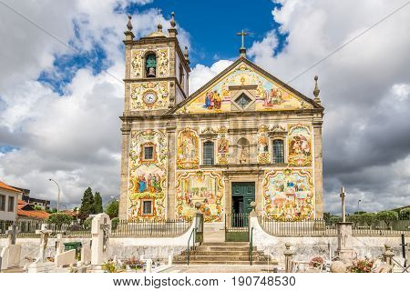 View at the painted decoration facade church Our Lady of Amparo in Valega - Portugal