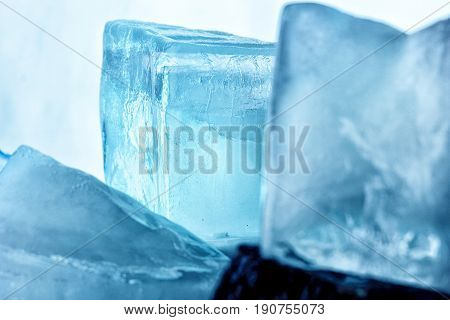 Ice With Stones.nature Background.melted Ice Cubes On The Rocks