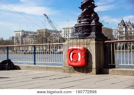 Lifebuoy at a Harbour .Lifeguard london river .