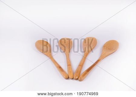Wooden spoon handmade isolated on white background.