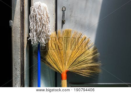 broom made from dry grass and mod