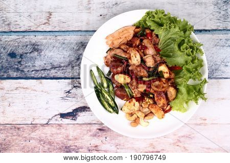 Spicy Fried Jackfruit Seeds And Chicken With Roasted Chile Paste.