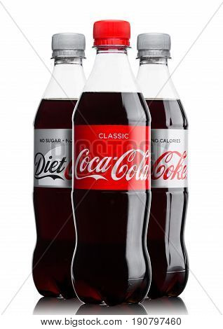 London, Uk - June 9, 2017: Bottles Of Coca Cola Soft Drink On White.the Coca-cola Company, An Americ