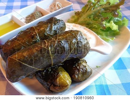 Dolmades, Grape Leaves Stuffed with Rice and Herbs, Traditional Greek and Mediterranean Appetizer