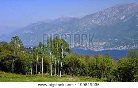 Madonna del Ghisallo at top of the famous Ghisallo pass (Como Lombardy Italy). View of the Como lake (Lario). The Madonna del Ghisallo is the protector of the cyclists