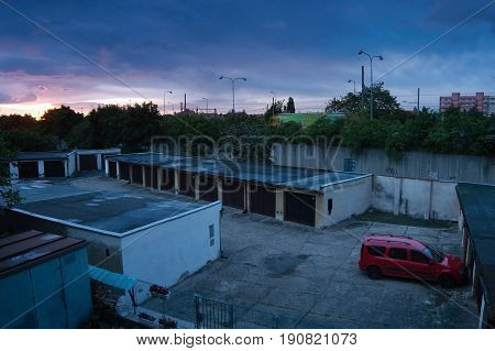 Chomutov, Ustecky Kraj, Czech Republic - May 24, 2017: Sunrise Over Garages And Route 13 In Spring