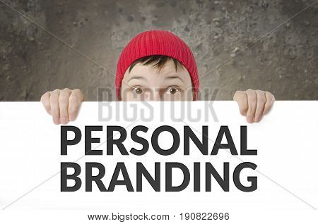 Surprised Female with Red Cap holds Personal Branding Card.