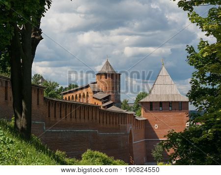 view on kremlin towers and wall from red brick in town of russia
