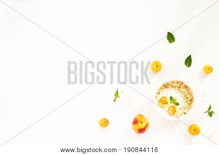 Fresh Summer Fruit. Healthy Breakfast With Peach, Nectarine, Apricot, Muesli, Peach Yogurt, Mint, Ce
