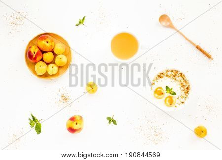 Fresh Summer Fruit. Healthy Breakfast With Peach, Nectarine, Apricot, Muesli, Peach Yogurt, Mint, Ju