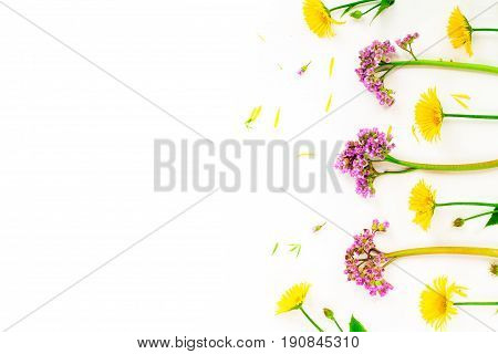 Flowers Composition With Yellow And Pink Spring Flowers On White Background. Copy Space, Flay Lay, T