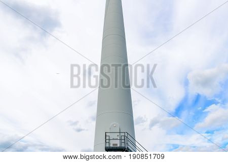 Day view wind power turbines generate electricity.