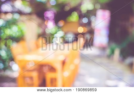 Blurred backgroundPeople in restaurant with bokeh light.