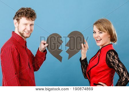 Smiling Couple Fixing Heart.