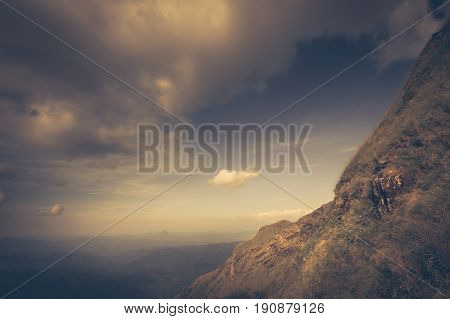 Mountain grass and blue skytop of green hill
