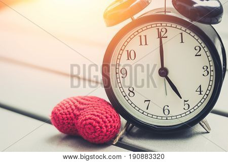 5 O'clock Of Retro Vintage Clock With Red Heart And Sun Light Morning, Loving Time Or Memory Times.
