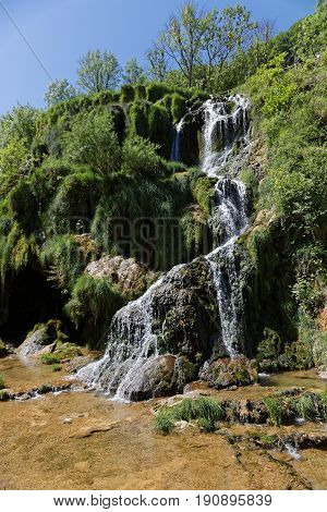 A waterfalls landscape in the Baume-Les-Messieurs valley.