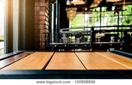 Table wood floor background in coffee shop