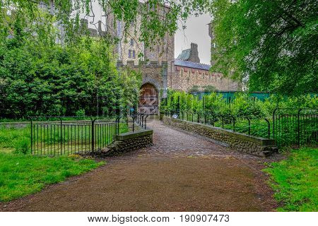 Cardiff castle entrance view from the park of this historic building.
