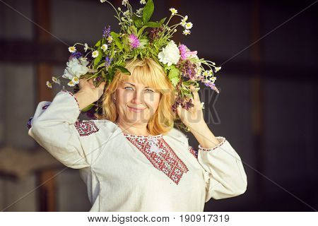 Beautiful woman with a wreath on her head