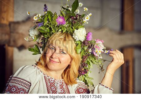 Beautiful woman with a wreath on her head