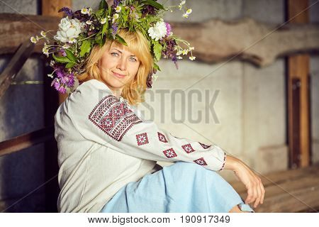 Beautiful woman with a wreath on her head