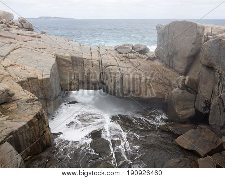 The Bridge, a natural geological formation in Torndirrup National Park, Albany, Western Australia