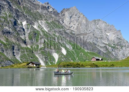 Lake Truebsee Over Engelberg On The Swiss Alps
