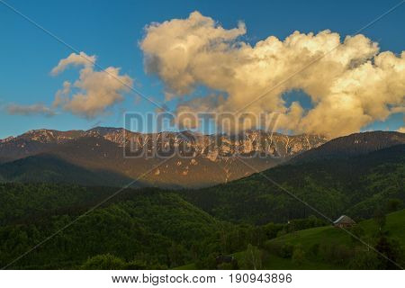 Majestic View With Sunset Light On The Snowy Bucegi Mount Peaks Carpathians Mountains Range Romania.