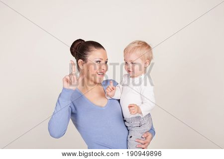 Mother And Little Boy Play Show Lodon' Kiss