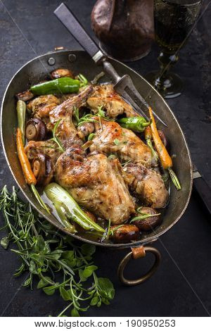 Rabbit with Vegetable and Mushrooms as top view in a Stewpot 