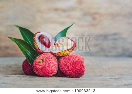 Fresh Litchi Fruit On An Old Wooden Background