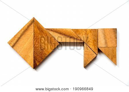 Wooden tangram puzzle in key shape on white background (Concept of data security authurized access safety)