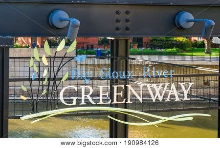 SIOUX FALLS SD/USA JUNE 3 2017: The Big Sioux River Recreation Trail and Greenway entrance sign.