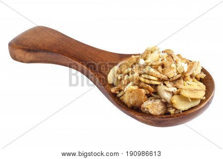 Muesli in wooden spoon over white background.