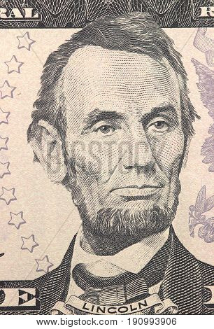 Abraham Lincoln Face On Us Five Or 5 Dollars Bill Macro, United States Money Closeup.