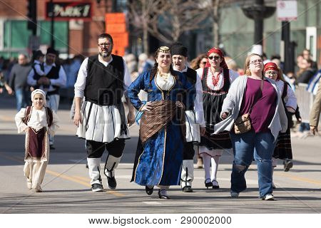 Chicago, Illinois, USA - April 29, 2018 woman wearing Pontos  traditional clothing at the Greek Independence  Day Parade